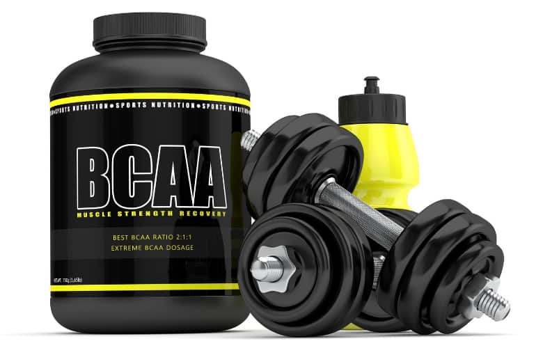 BCAA Powder next to weights